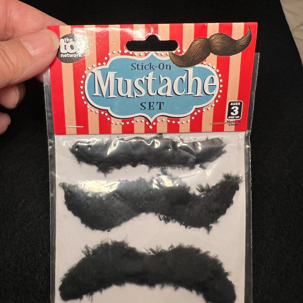 Stick on mustache set - great for Halloween or just dress up. New in packaging.